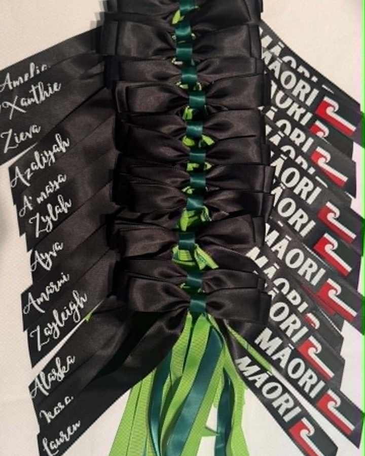 Black and green Maori ribbons with names